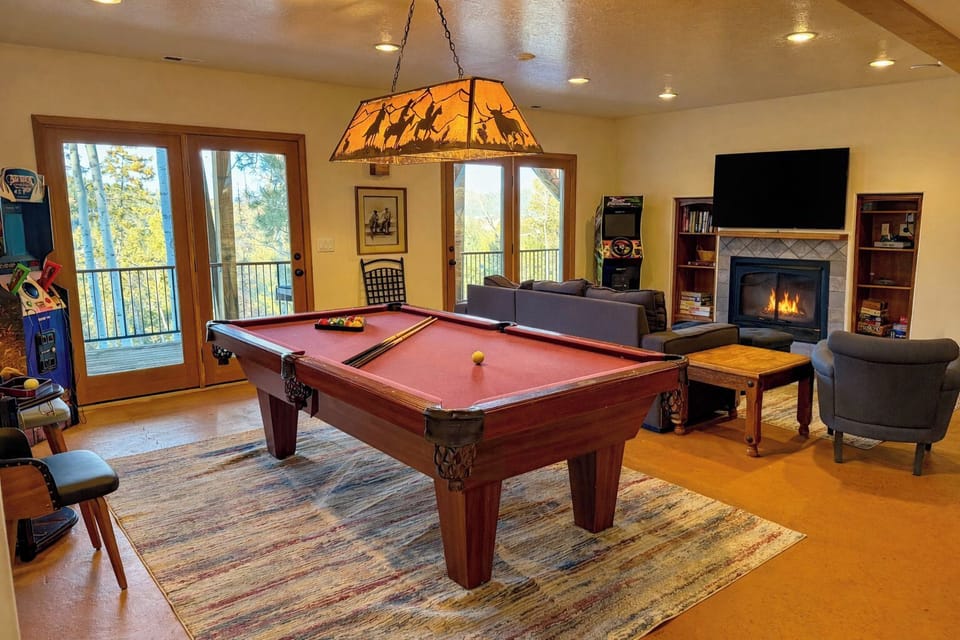 The ultimate hangout! Features a full pool table, arcade games and big-screen TV