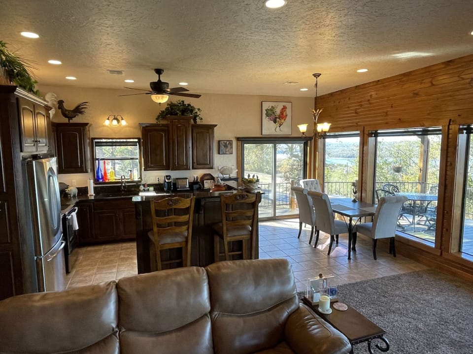 Open concept kitchen, dining and living room. 