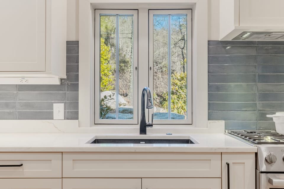Kitchen Window with Views of our native rhododendrons