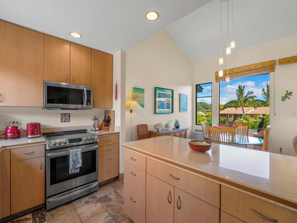 Appliances: Features a new Sub-Zero refrigerator, oven, microwave, dishwasher, elegant cabinetry, and a custom kitchen island.