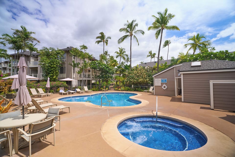 Choose from two sparkling resort swimming pools surrounded by sun-drenched lounge areas and tropical palms.