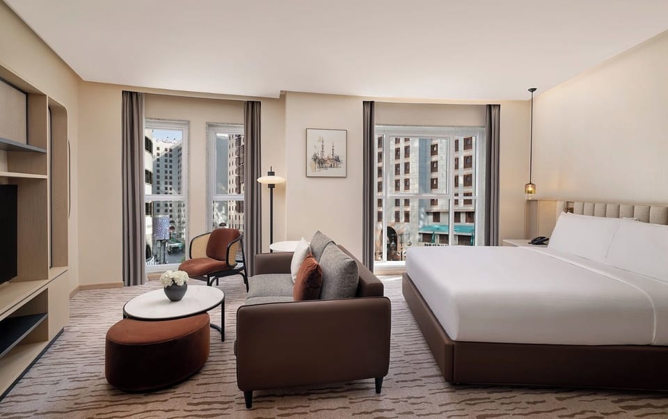 Junior Suite, 1 King Bed (Palm) | Living area | 48-inch Smart TV with digital channels