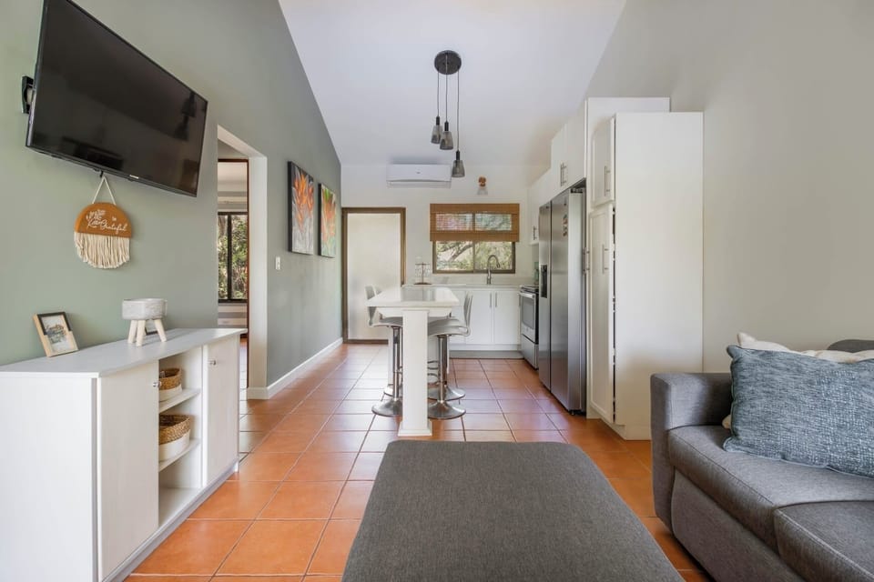 Open floor concept from front door to kitchen. Second bedroom pictured. 