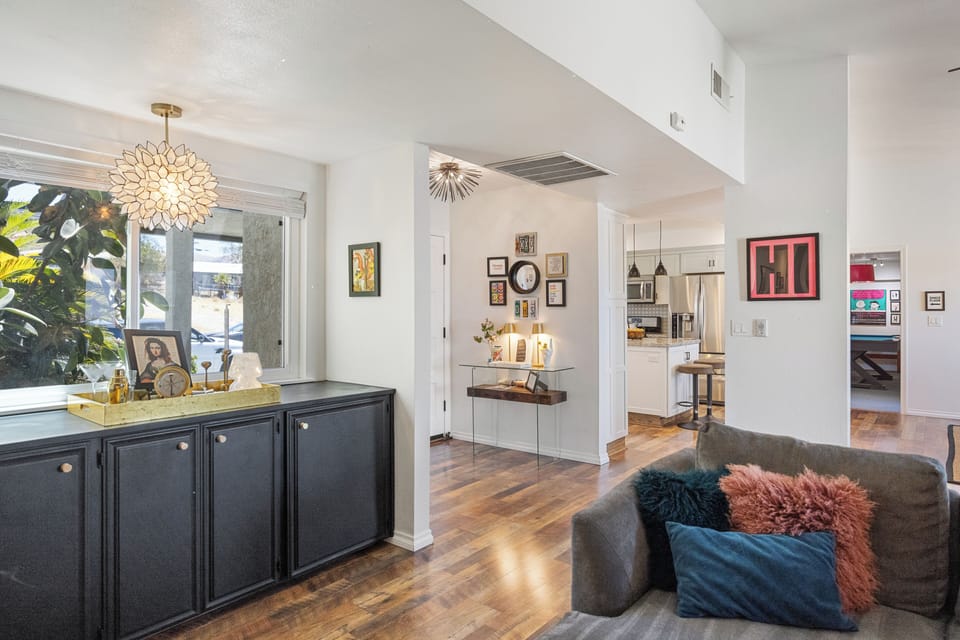 The stylish entry opens into bright, inviting spaces designed for your stay.
