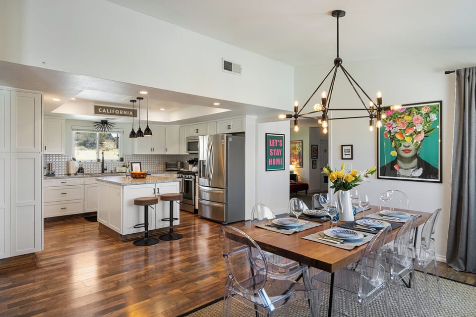 Gather around the dining table with the kitchen just steps away for easy entertaining.