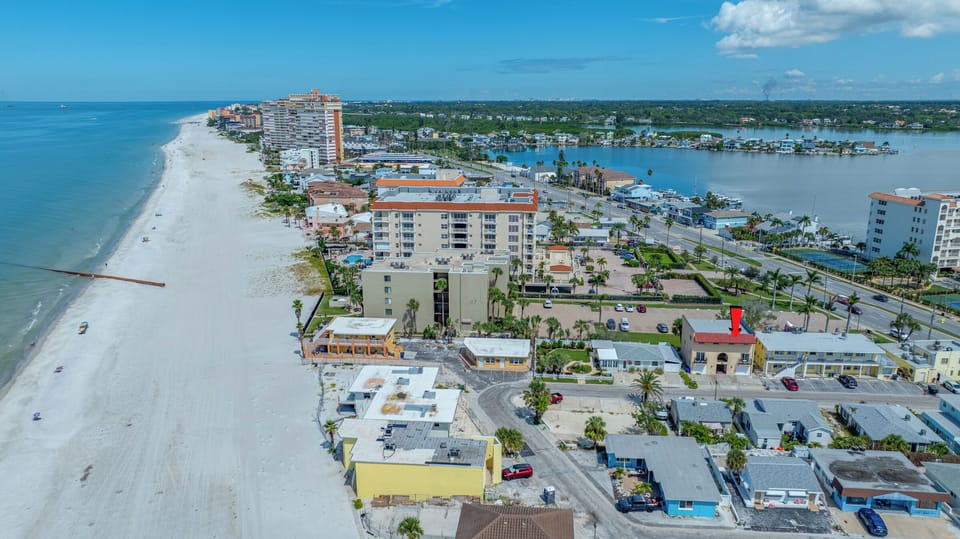 Ariel view showing how close the unit is to the beach