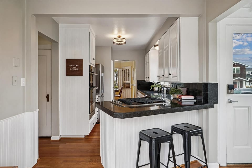 The walk through kitchen keeps guests connected to the rest of the home.