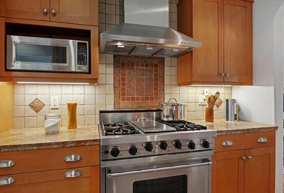 Kitchen appliances include, range, microwave & dishwasher