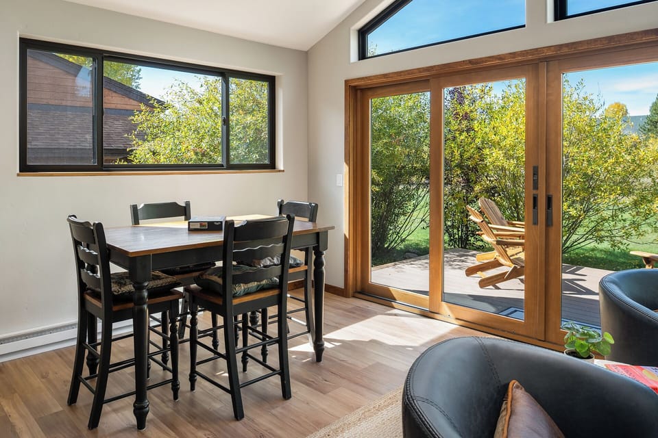 Bar height table with seating for four