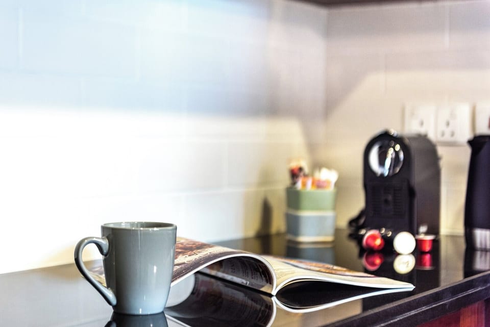 Deluxe Apartment, 1 Bedroom, Balcony, City View | Private kitchen | Fridge, microwave, oven, stovetop