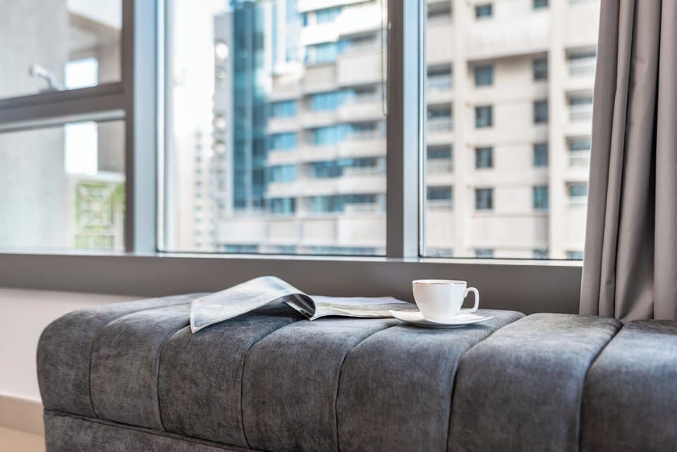 Deluxe Apartment, 1 Bedroom, Balcony, City View | Living area | 43-inch flat-screen TV with digital channels, Netflix