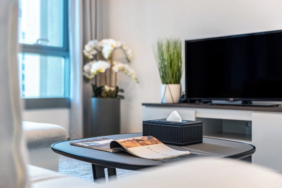 Deluxe Apartment, 1 Bedroom, Balcony, City View | Living area | 43-inch flat-screen TV with digital channels, Netflix