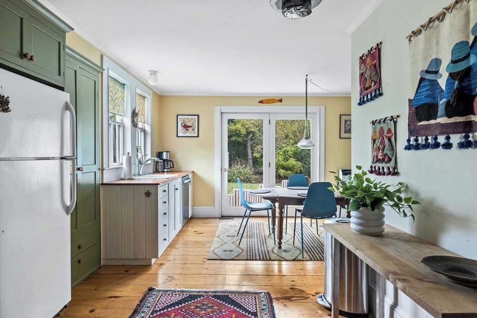 Open kitchen and dining area with backyard access
Designed for easy meals, conversation, and everyday comfort.