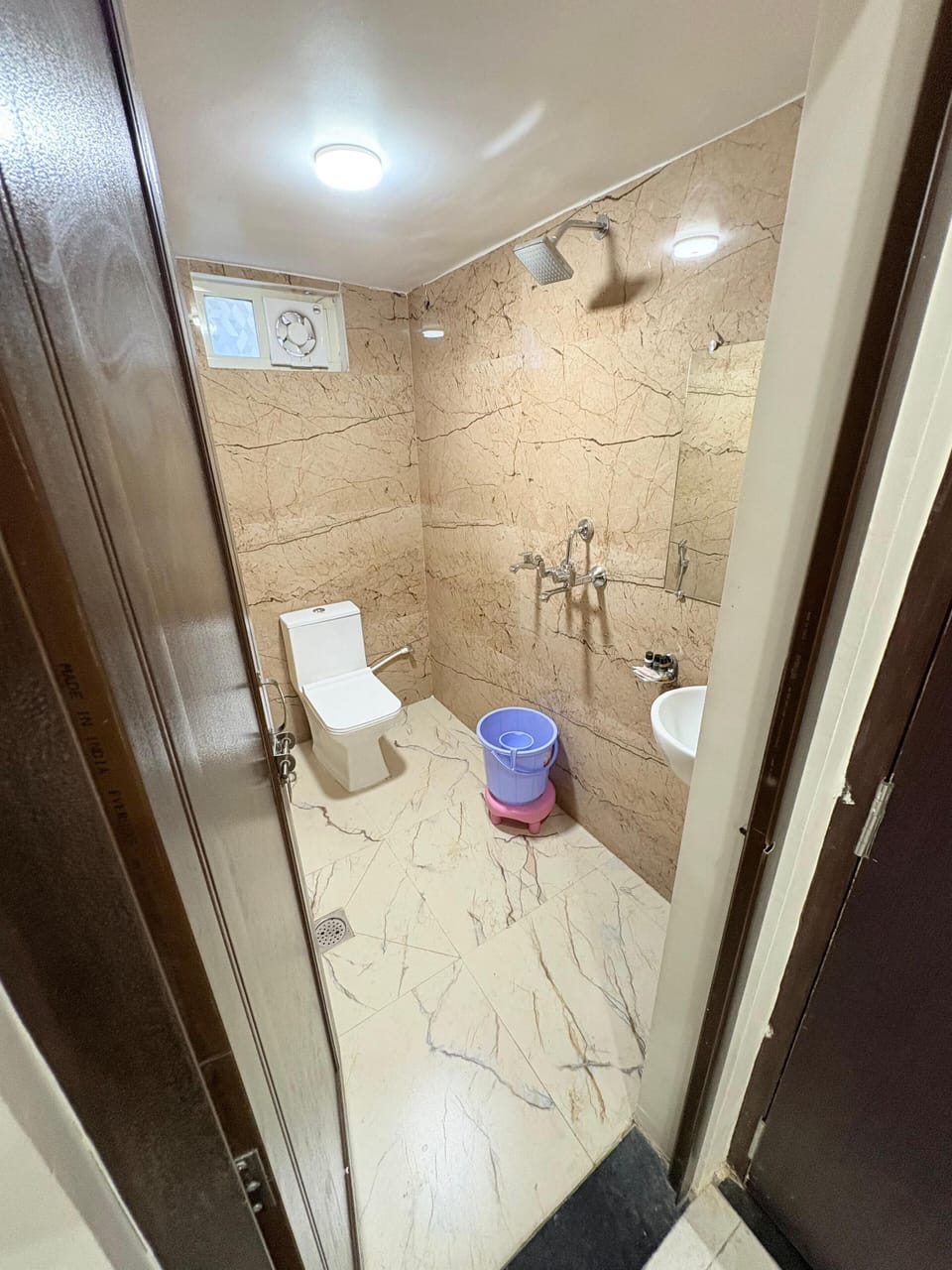Deluxe Double Room, City View | Bathroom | Shower, slippers, towels, soap