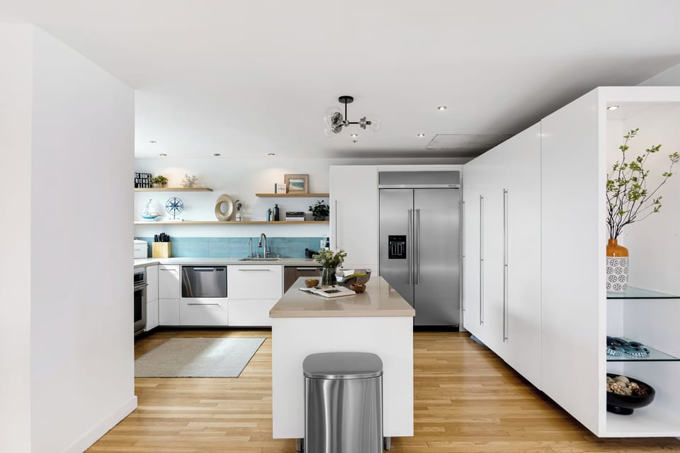 Sleek, modern kitchen area.
