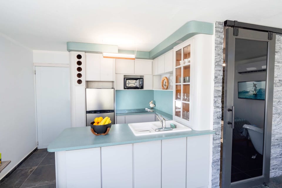 A bright modern kitchen with coastal tones and everything you need for easy cook