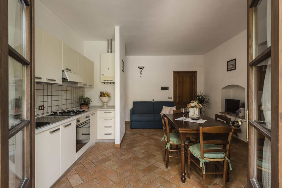 Classic Apartment | Private kitchen | Full-size fridge, oven, stovetop, highchair