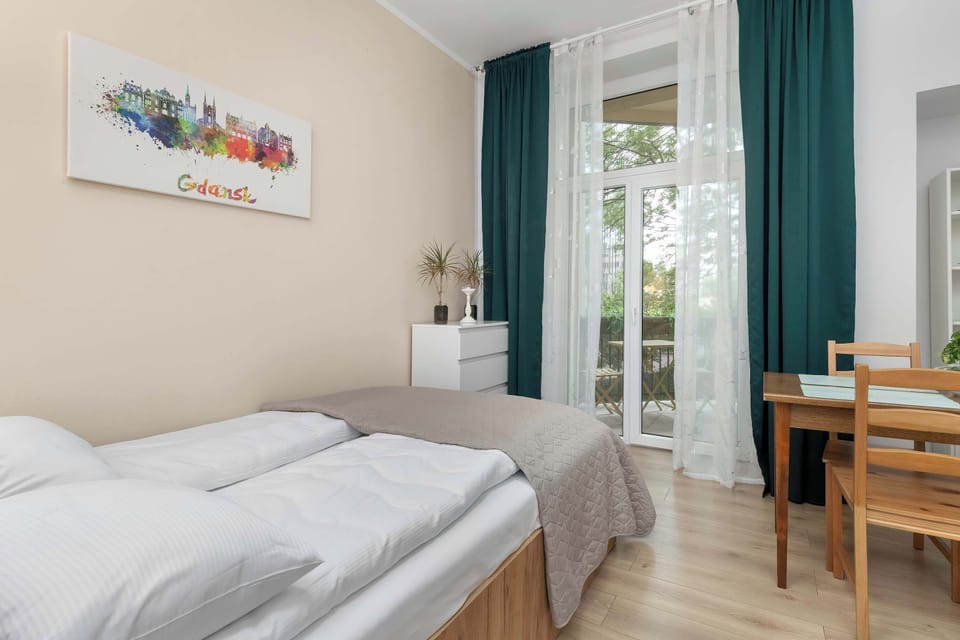 The bedrooms' modern amenities ensure a comfortable stay.