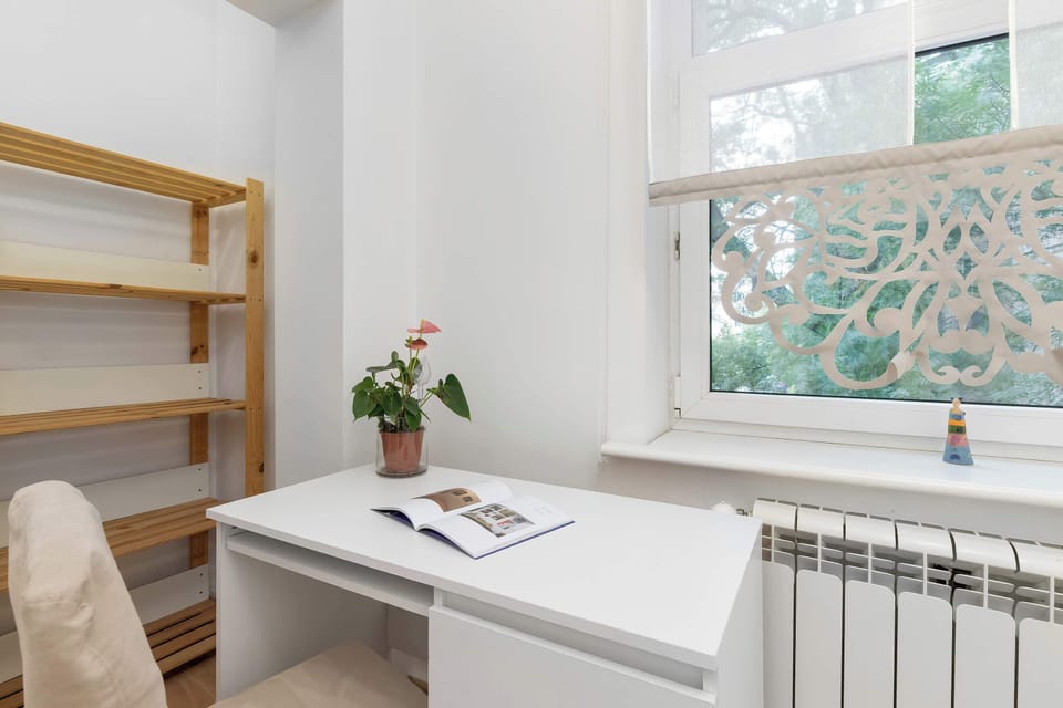The bedroom's stylish furnishings create a serene retreat.