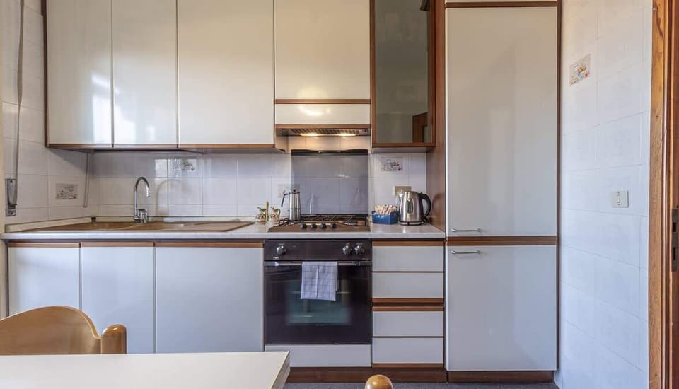 living and fully equipped kitchen