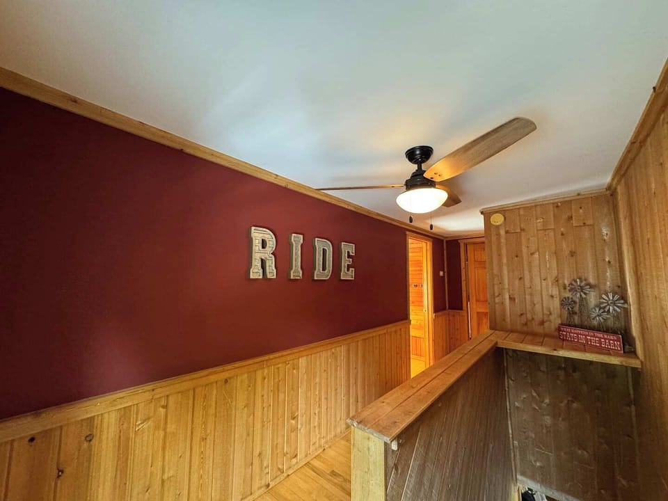 Upstairs - leading to King and Queen bedrooms and a full bath with a sauna