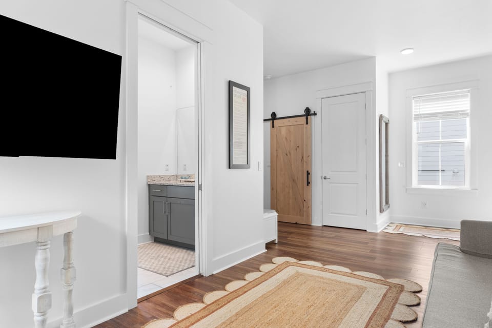 Lounge area with access to the hallway bathroom.