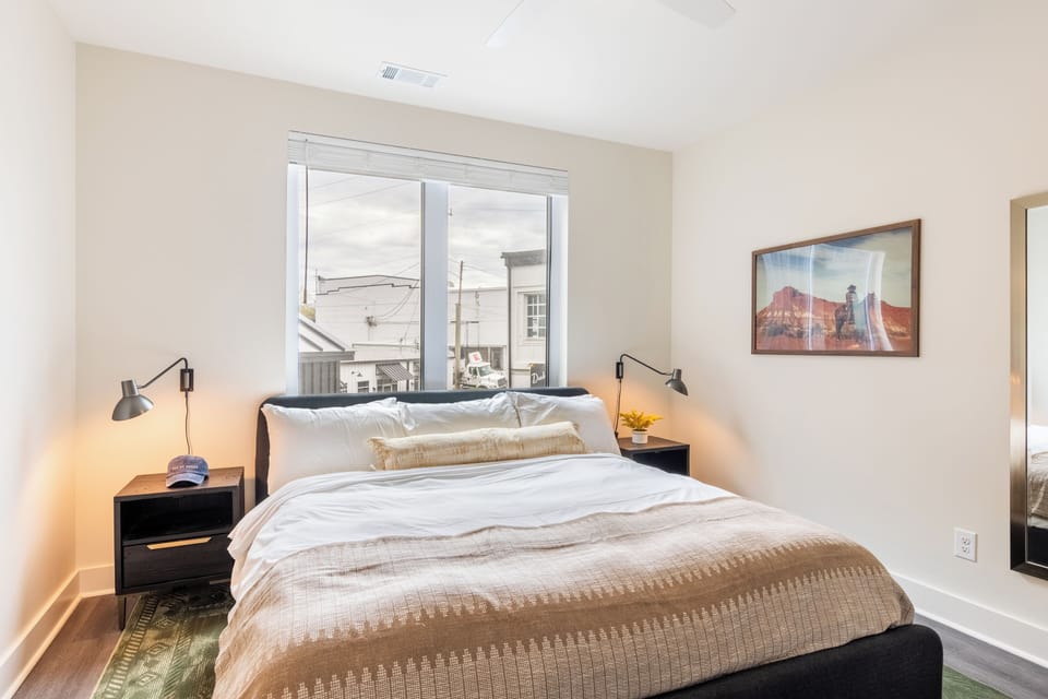Primary bedroom features a king bed and ensuite bathroom.