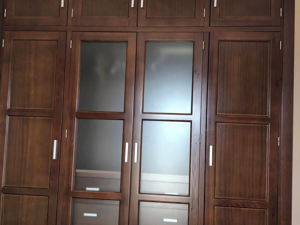 Hand built wardrobes covering entire wall 
