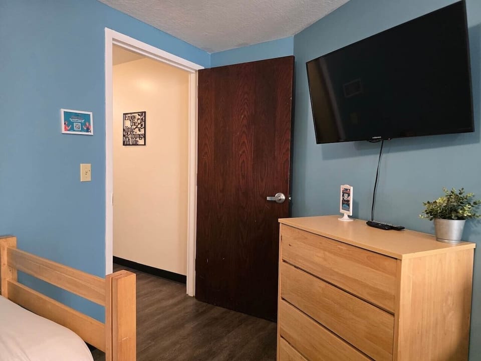 Wall-mounted TV & dresser combo, handy storage w/ entertainment built in