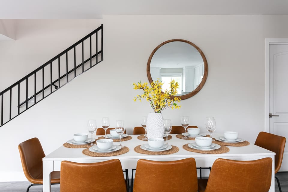Dining area with seating for six and decorative accents