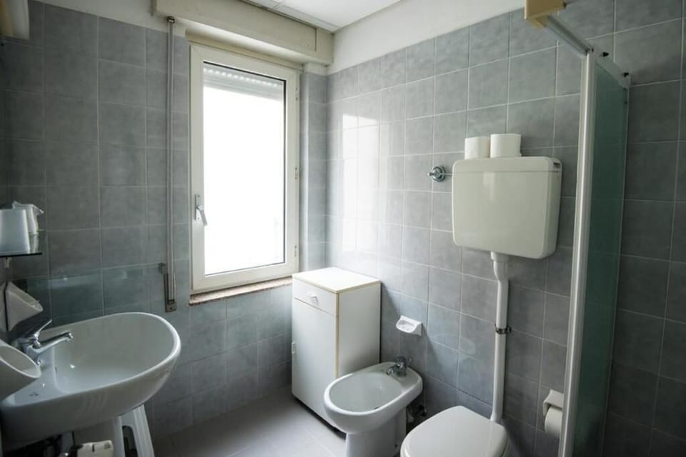 Classic Triple Room, Balcony, Sea View | Bathroom | Shower, hair dryer, towels, soap