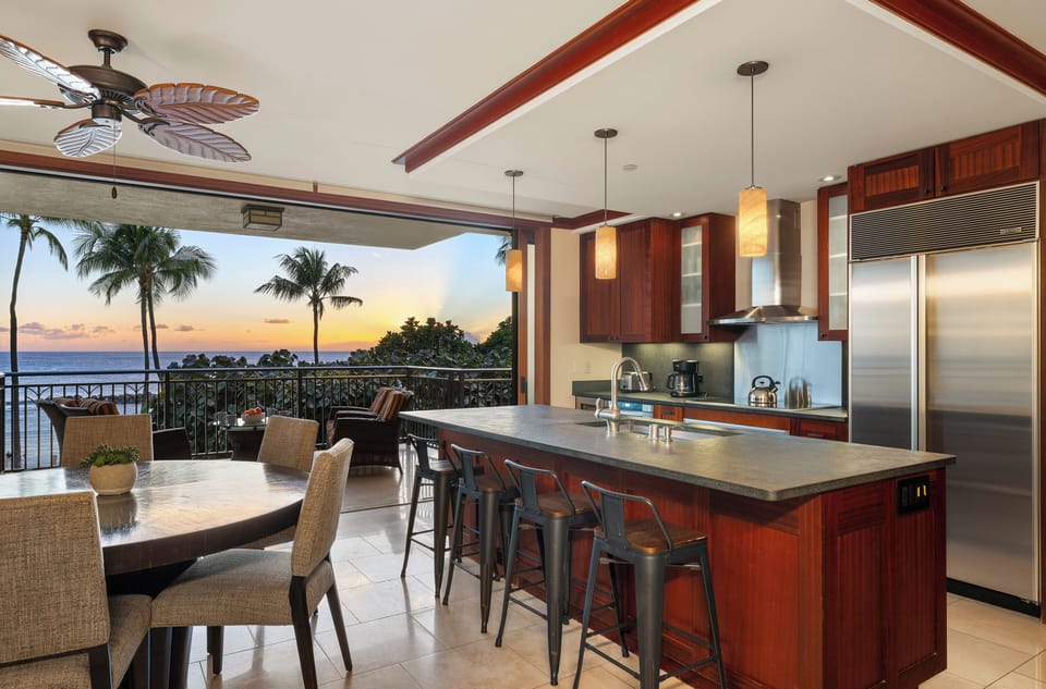 Chef-ready kitchen with Sub-Zero, Wolf appliances, and wine fridge.