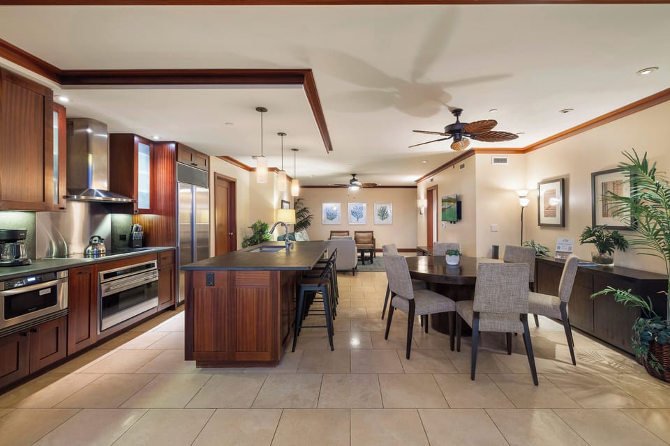 Open kitchen and dining layout, ideal for gathering.