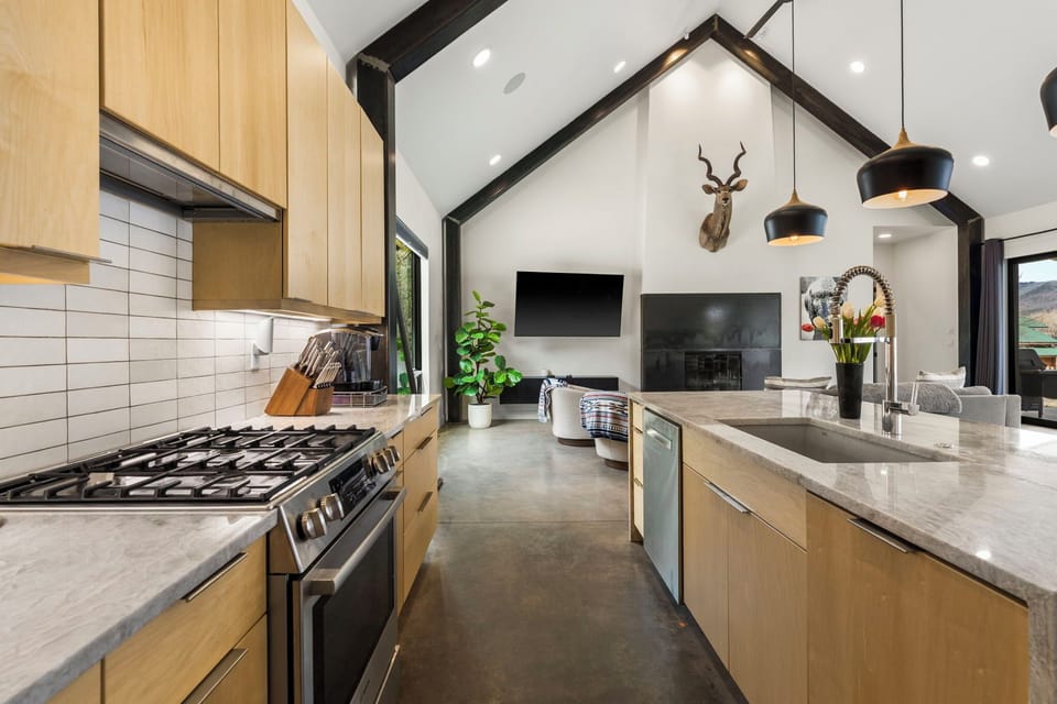Fully equipped kitchen with plenty of space to cook, prep, and hang out — because meals here tend to turn into moments.