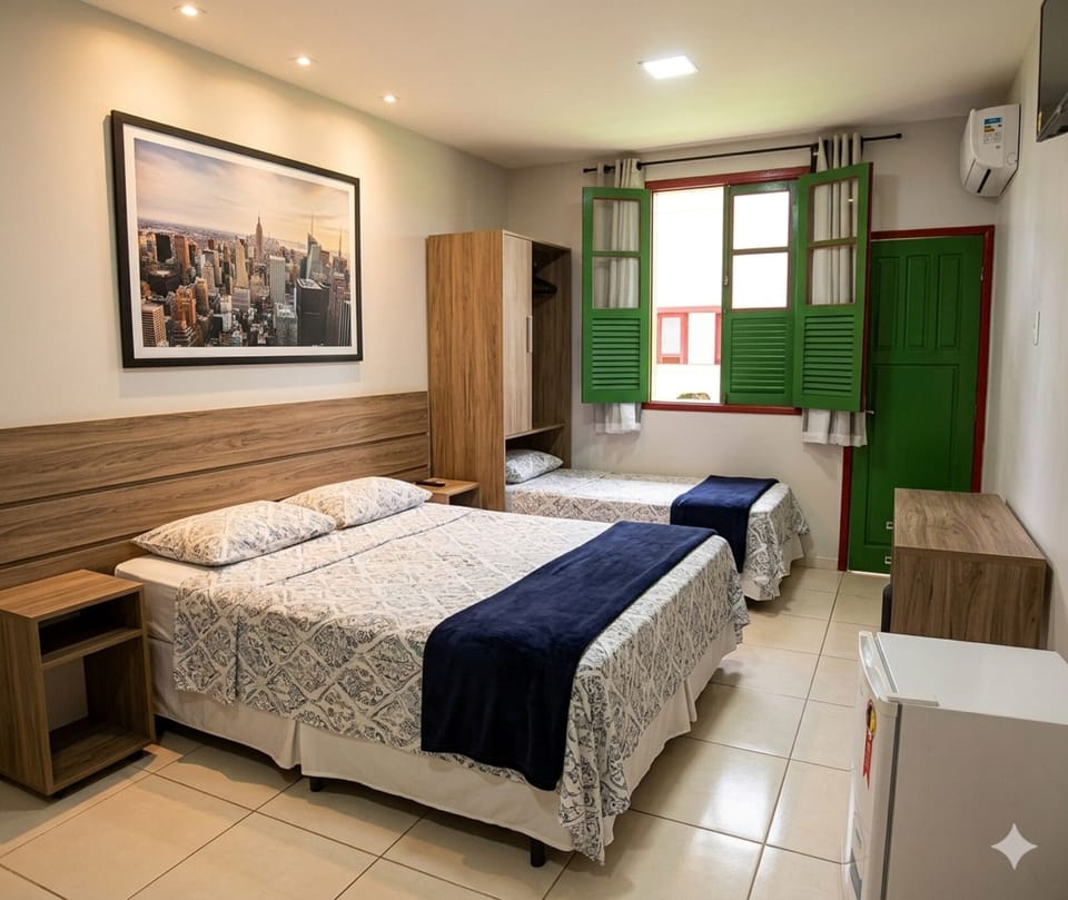 Family Room | Minibar, desk, WiFi (free), bed sheets