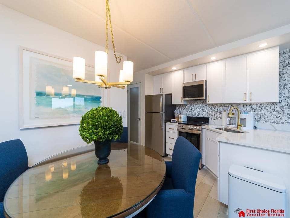 Bright, modern kitchen with cozy dining nook for gatherings!