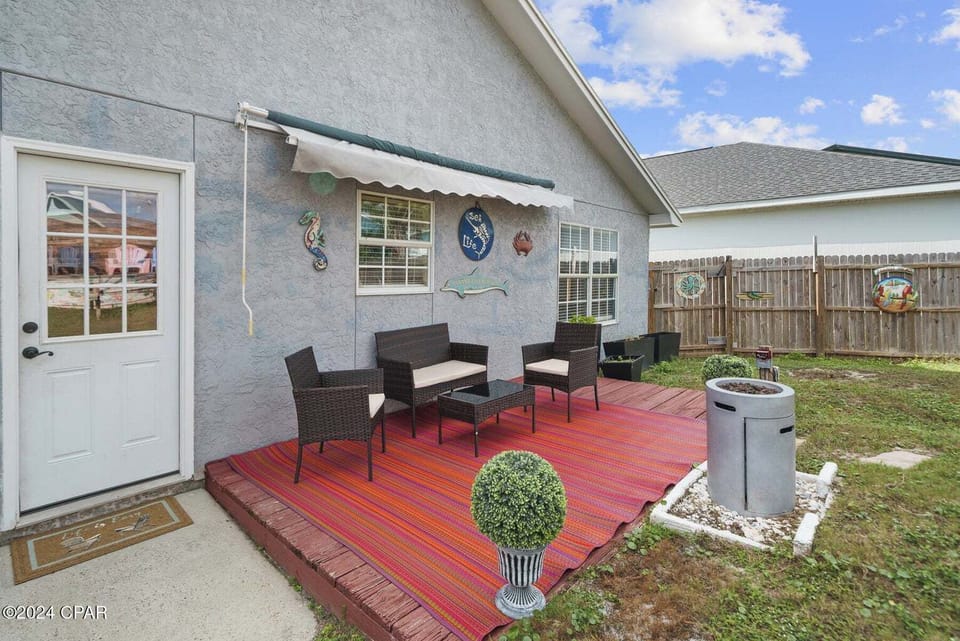 Evenings spent outside with the cozy fire pit are just what you need after a fun day at the beach.