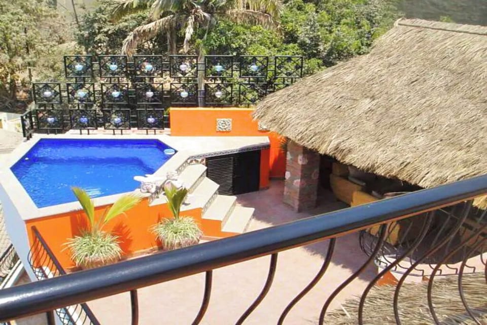 Dipping pool and palapa from sunroof level.