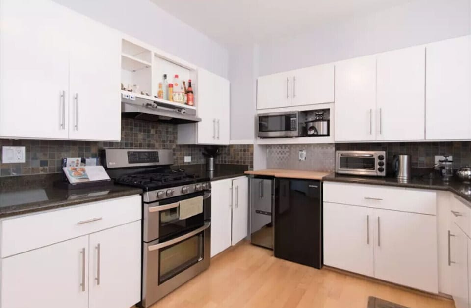 Fully stocked kitchen with dishwasher, double oven, large French door refrigerator