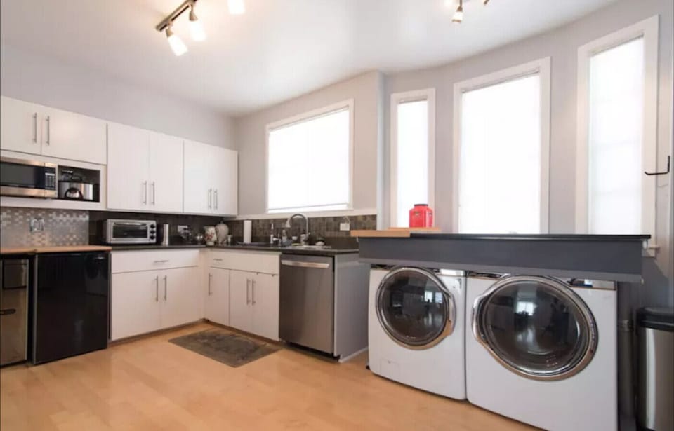Fully stocked kitchen with dishwasher, double oven, large French door refrigerator
