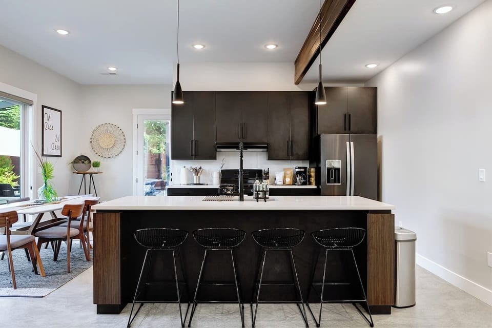 Granite counter tops and this large cooking island featuring seating for 4 is the perfect place to supervise the meal preparation or extra seating for dinner!