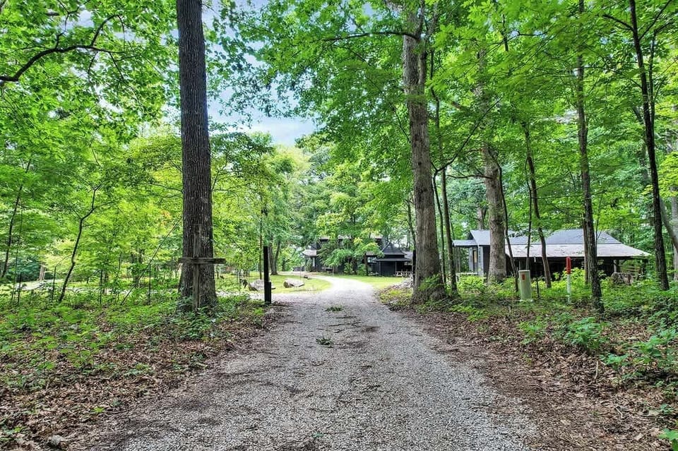 Lost Cove Retreat + Treetop Bungalow Gravel Entrance 