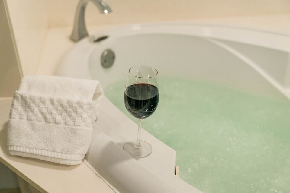 Bubbles in the bath, wine in hand — vacation goals achieved. 🫧🍷
