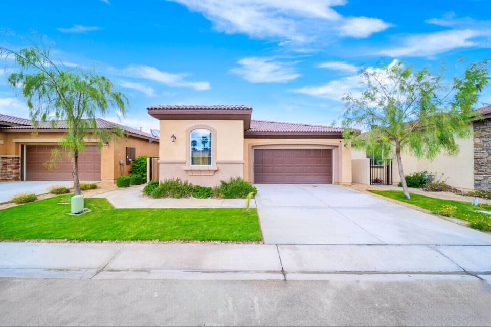 Street View of the House with Both Garage & Driveway Parking