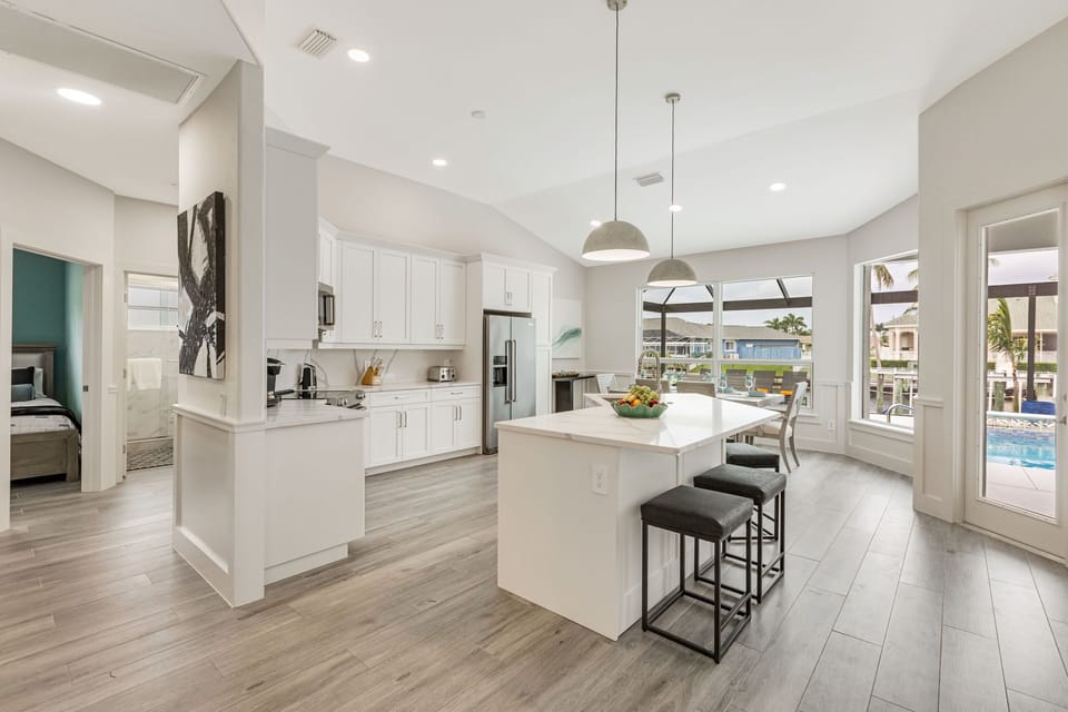 Open Kitchen with Large Island offering Additional Seating