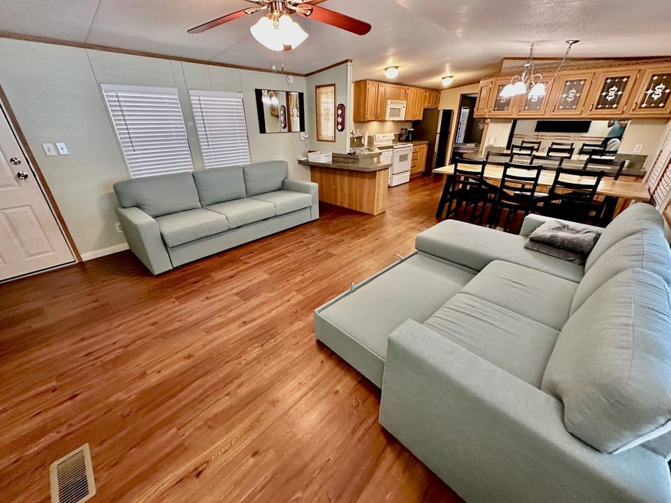open living/dining/kitchen, those couches pull out sleep one each
