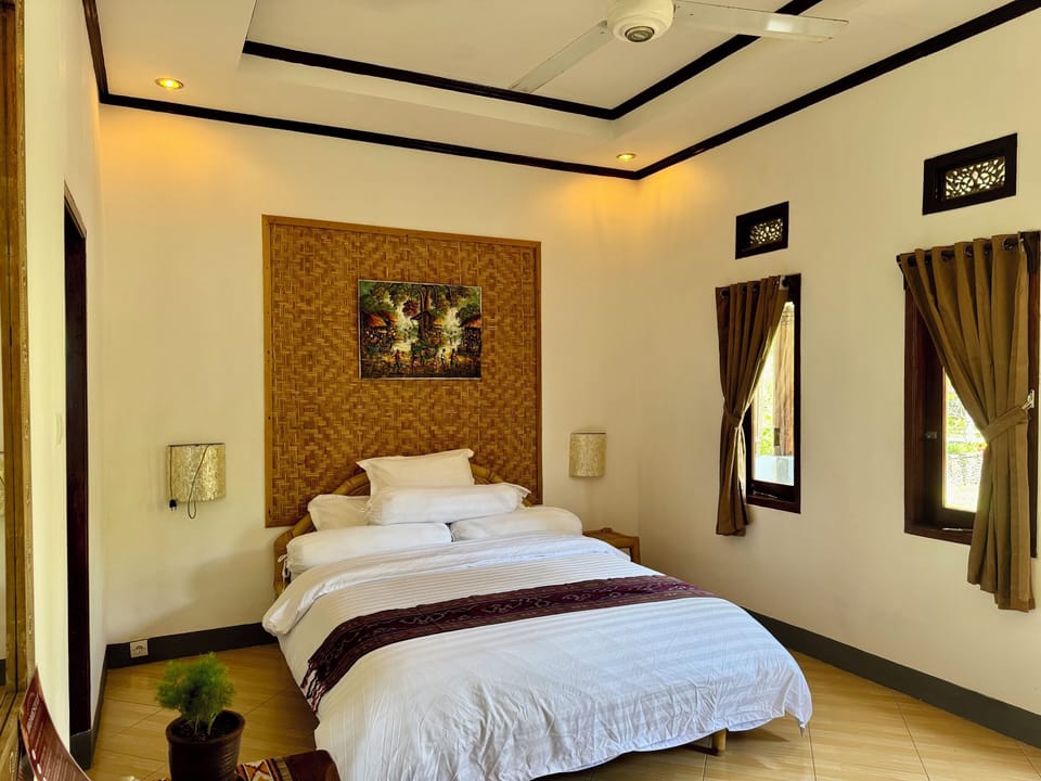 Deluxe Room, Garden View | Desk, laptop workspace, soundproofing, WiFi (free)