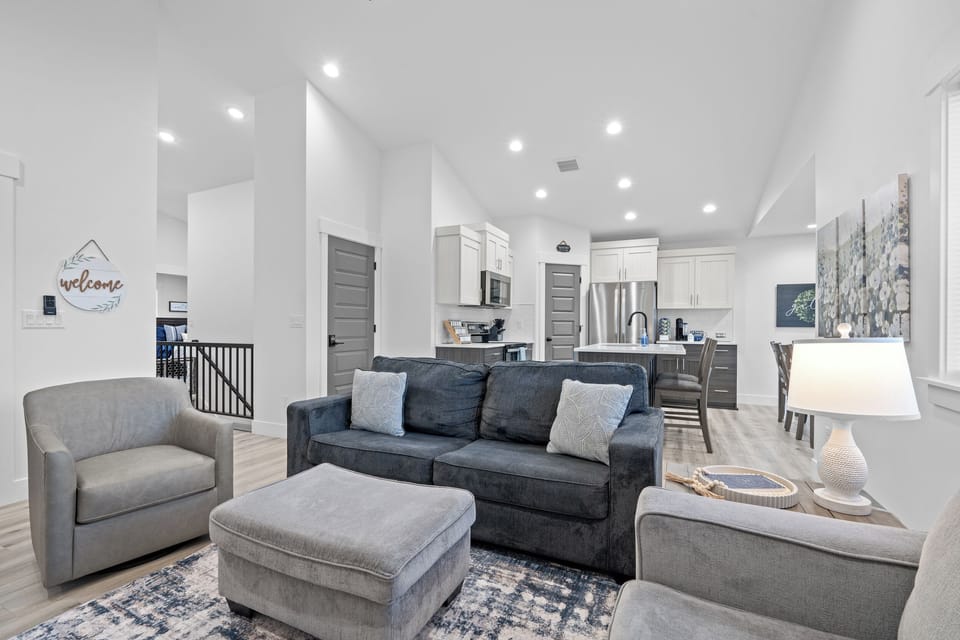 Living room looking into the kitchen and dining areas