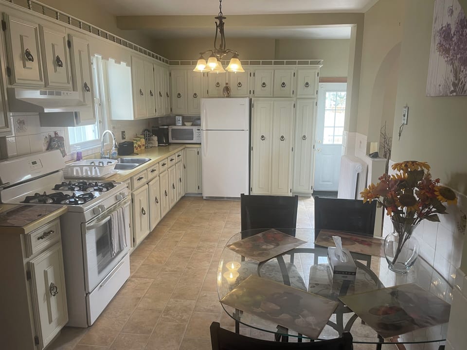 Deluxe House, Patio | Private kitchen | Coffee/tea maker, electric kettle, toaster, spices