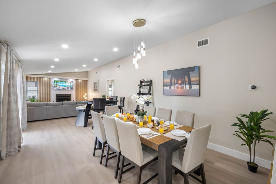The open layout connects the dining area to the kitchen and living spaces, creating the perfect flow for entertaining.